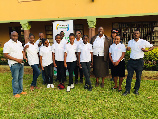 SOME youth Journalists: as African Youth Storytellers, posing for a photo with Lundazi District Commissioner, Marjory Banda after a digital media storytelling training at JohnEster Lodge in Lundazi, Eastern Region of Zambia