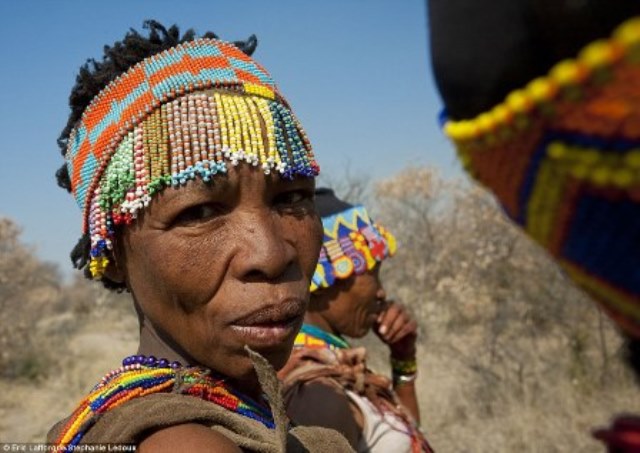 Colourful: The women of the San tribe make their colourful beads from ostrich egg shells and make extra money by selling them to tourists
