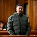 Tshuma, suspecté de familicide, comparaît devant le tribunal de Johannesburg pour une accusation d'arme à feu, l'affaire d'extradition reportée au 22 juillet